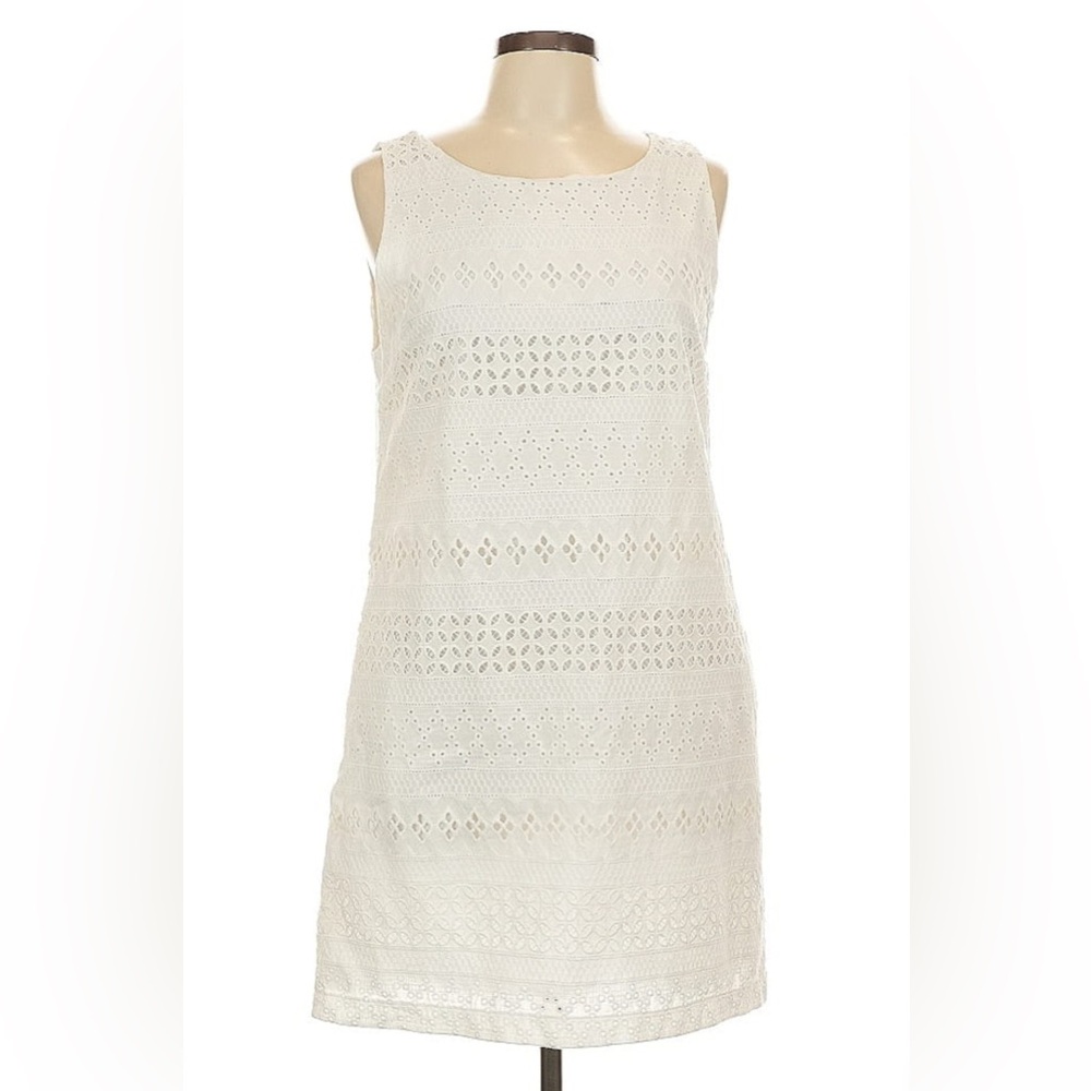 Heyton Dress like new , never been worn
Small white dress